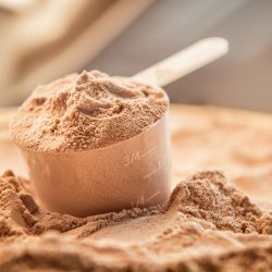 Whey protein scoop. Sports nutrition.